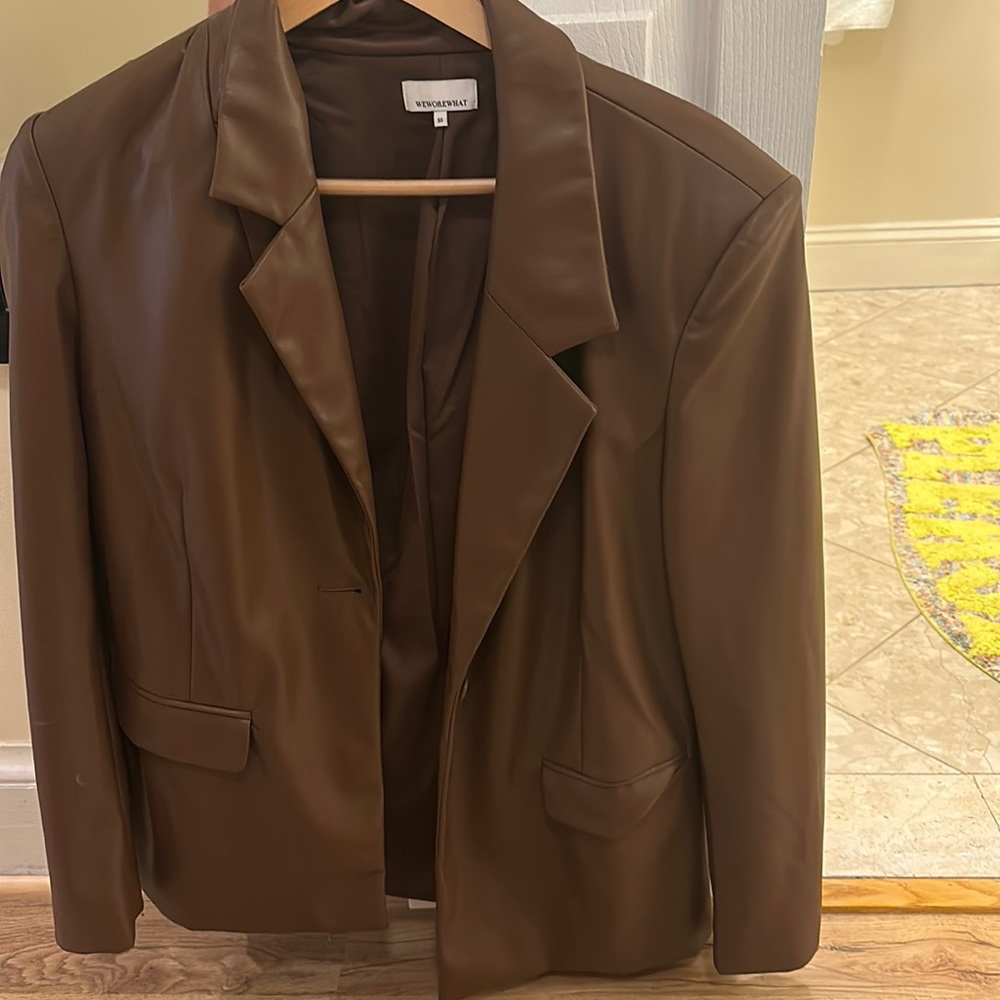 We wore what brown leather blazer